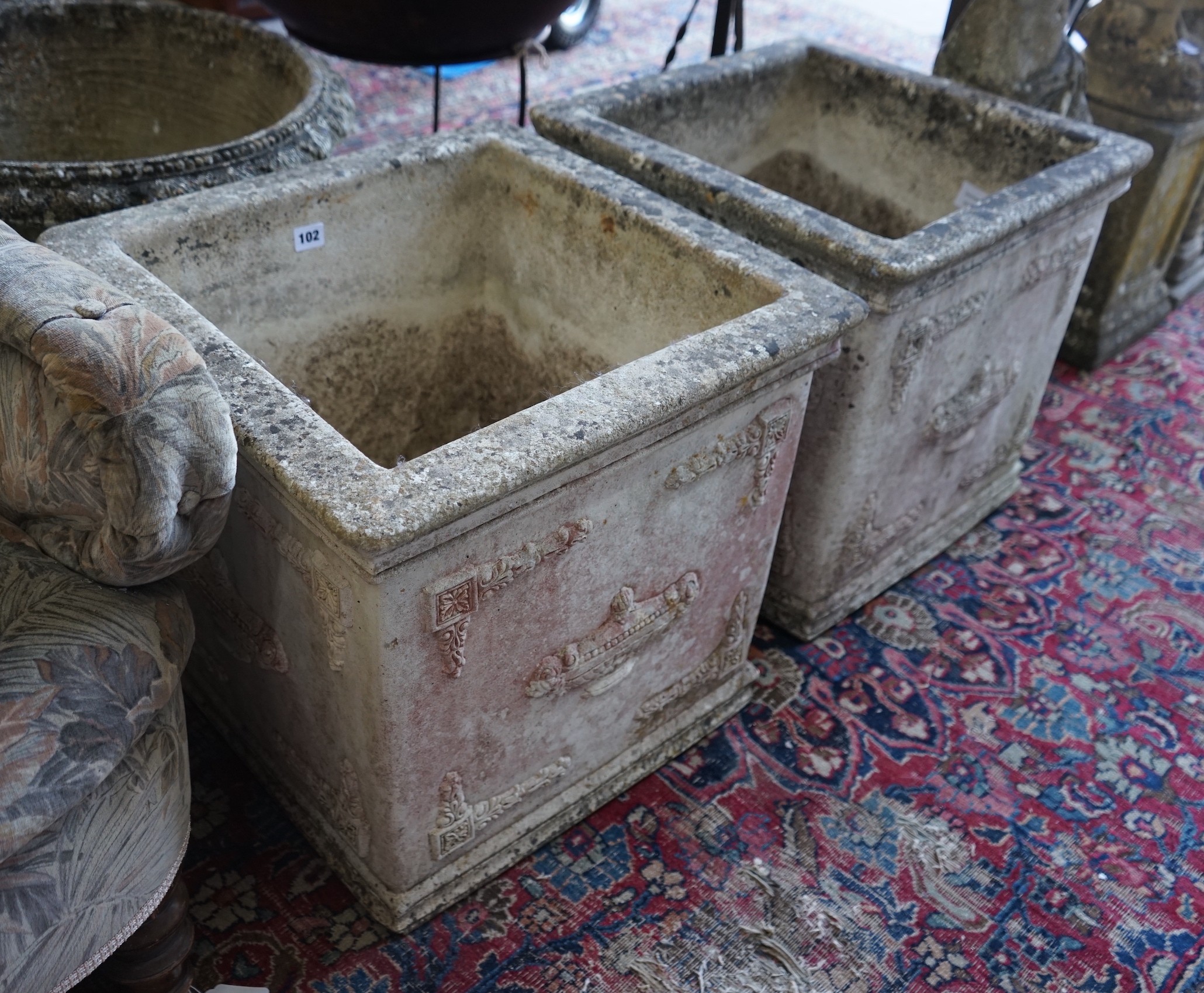 A pair of square reconstituted stone garden planters, width 50cm, height 49cm